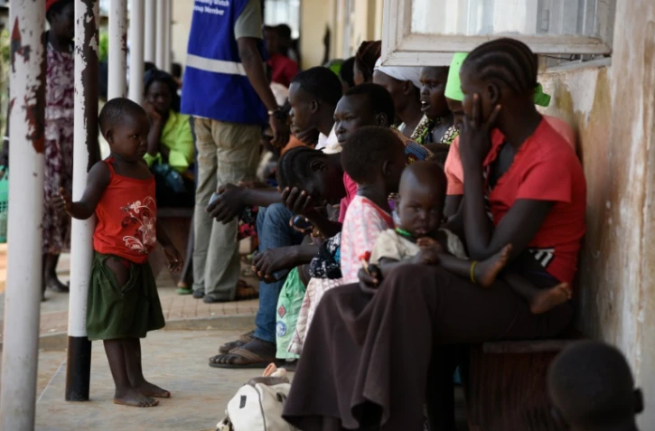 Des réfugiés du Sud-Soudan arrivent à Elegu, le 13 juillet 2016