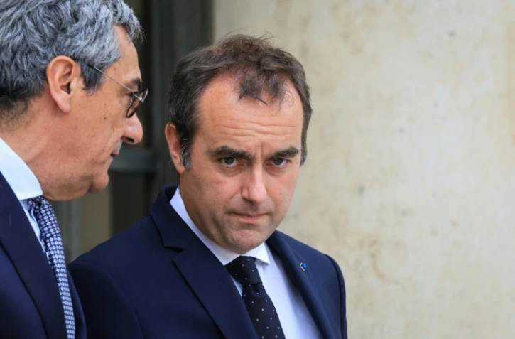 Le ministre du Commerce, Serge Papin et le Premier ministre, Sébastien Lecornu, au palais de l'Élysée à Paris le 20 mai 2026