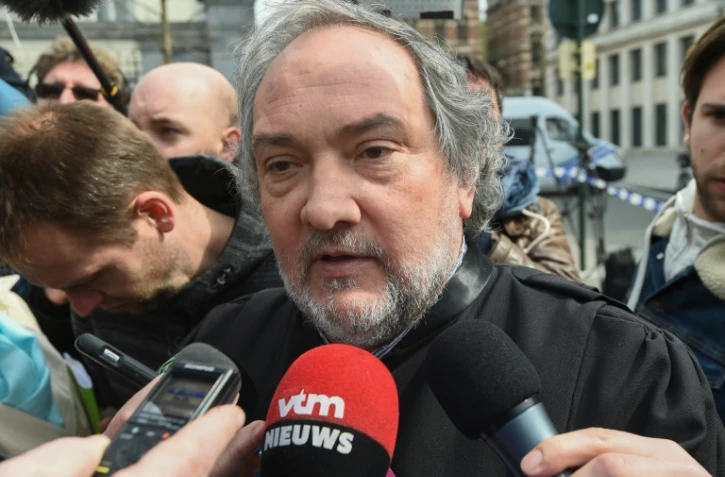 Vincent Lurquin, avocat d'Osama Krayem, répond aux questions des journalistes, devant le palais de justice de Bruxelles, le 14 avril 2016