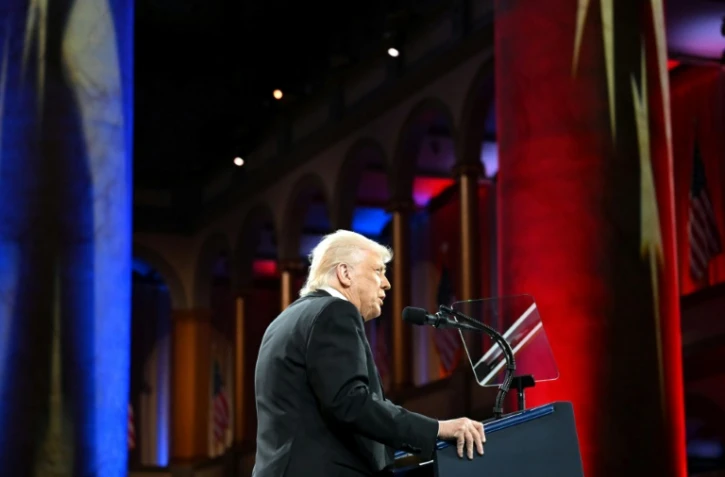 Le président américain Donald Trump lors d'un dîner du parti républicain, le 8 avril 2025 au Musée national de Washington