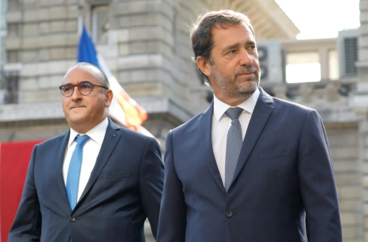Le ministre de l'Intérieur Christophe Castaner (C) et le secrétaire d'Etat Laurent Nunez le 20 août 2019 à Paris