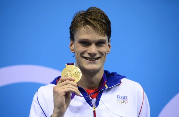 Yannick Agnel avec sa médaille d'or des JO-2012 sur 200 m nage libre, le 30 juillet 2012 à Londres