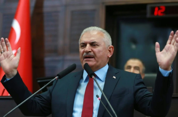 Le Premier ministre turc Binali Yildirim s'exprime devant les membres de son parti AK le 19 juillet 2016 Ă Ankara