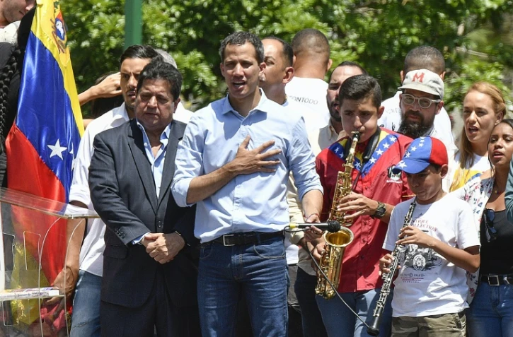 L'opposant Juan Guaido (c) lors d'un rassemblement de ses partisans, le 6 avril 2019 à Caracas