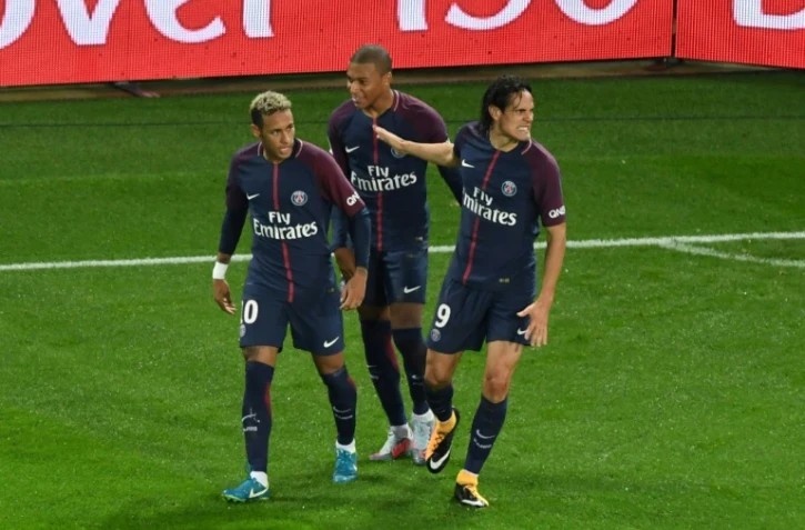 Neymar Jr, Kylian Mbappé et Edinson Cavani à la fête après le premier but de Paris contre Lyon au Parc des Princes, le 17 septembre 2017