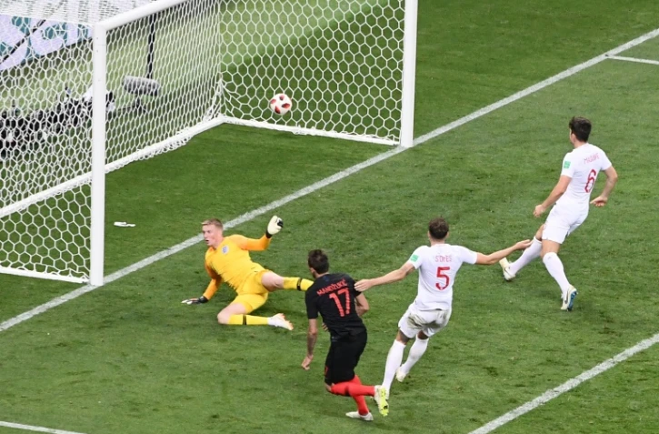 L'attaquant Mario Mandzukic inscrit le but de la victoire pour la Croatie contre l'Angleterre en prolongtaion de la demi-finale du Mondial, le 11 juillet 2018 à Moscou 