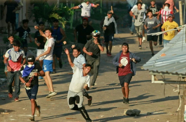 Affrontements entre partisans et détracteurs du président socialiste bolivien Evo Morales, le 23 octobre 2019 à Santa Cruz