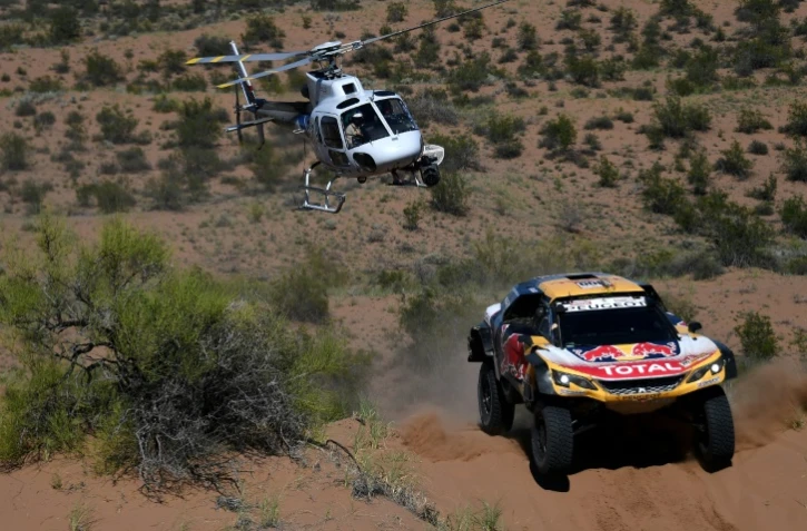 Le Français Stéphane Peterhansel au volant de sa Peugeot lors de l'étape San Juan-Cordoba du Dakar-2018, le 19 janvier 2018