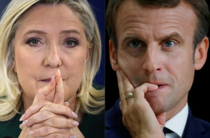 Photomontage de Marine Le Pen et Emmanuel Macron, en lice pour le second tour de l'élection présidentielle en France le 24 avril 2022