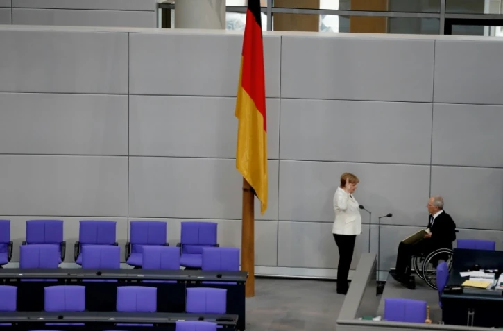 La chancelière Angela Merkel prête serment devant le président allemand Wolfgang Schaueuble, le 14 mars 2018 au Bundestag à Berlin
