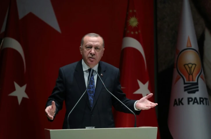 Photo fournie par la présidence turque du président Recep Tayyip Erdogan devant le Parlement turc, le 26 décembre 2019 à Ankara