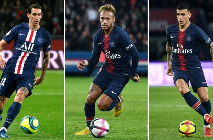 (g à d) L'Argentin Angel Di Maria, à Paris, le 9 février 2020; le Brésilien Neymar, à Paris, le 7 octobre 2018; et l'Argentin Leandro Paredes, à Paris, le 7 avril 2019