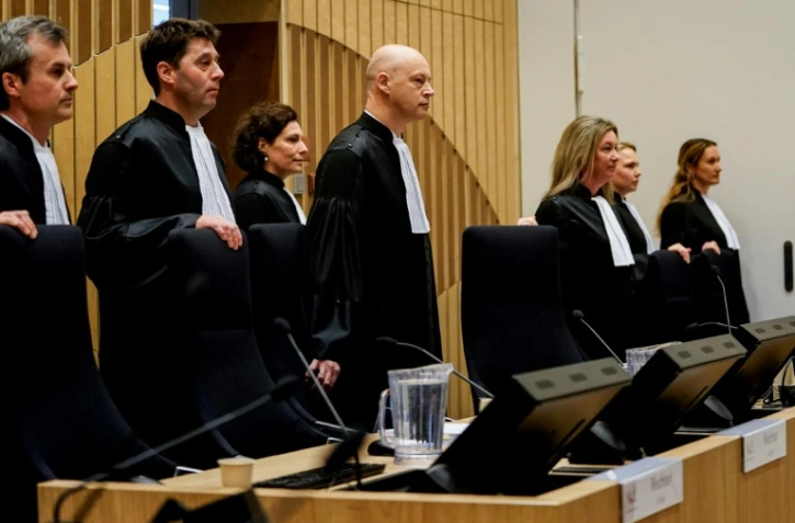 La Cour, au tribunal de Schiphol, lors de l'ouverture du procès de trois Russes et un Ukrainien accusés d'avoir provoqué l'explosion de l'appareil au-dessus de l'Ukraine en 2014, le 9 mars 2020