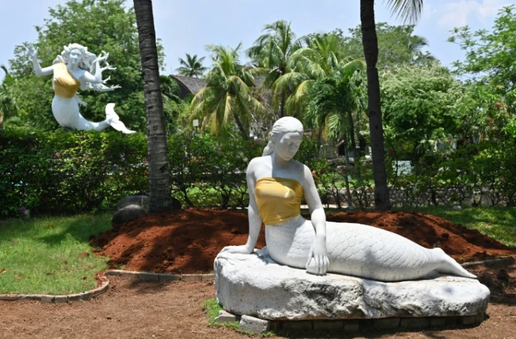 The bare chests of two mermaid statues have been covered up at an Indonesian theme park