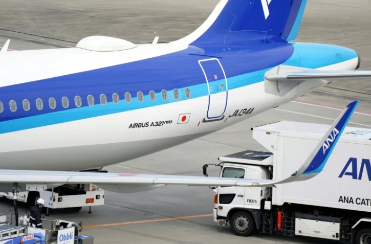 Un Airbus 321 neo de la compagnie All Nippon Airways (ANA) sur le tarmac de l'aéroport Haneda de Tokyo, le 29 novembre 2025