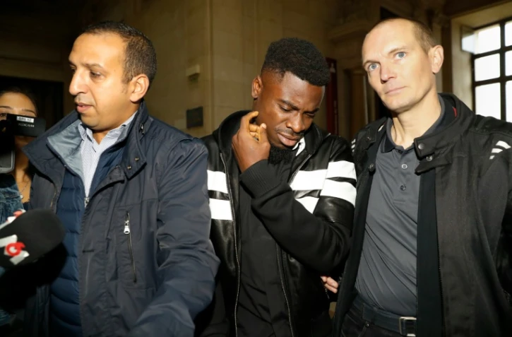 Le défenseur ivoirien du PSG Serge Aurier à son arrivée le 26 septembre 2016 au Palais de justice de Paris