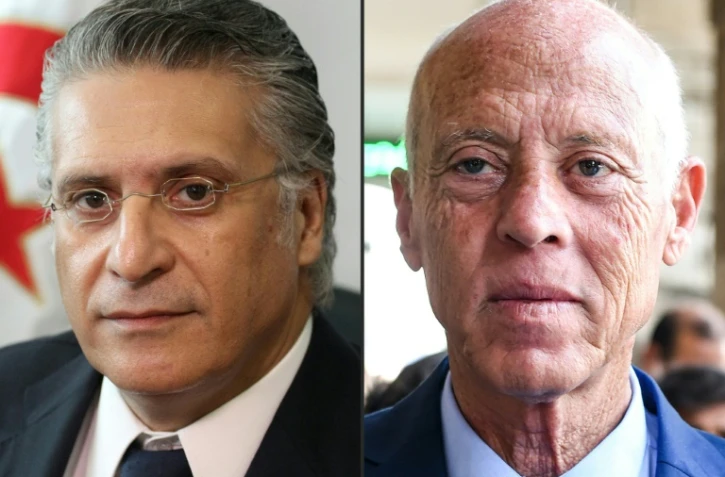 Montage de photos créé le 16 septembre 2019 montrant les deux candidats à la présidentielle tunisienne Nabil Karoui (G) magnat des médias actuellement emprisonné et Kais Saied (D), universitaitaire indépendant sans affiliation politique. Ces deux candidats sont qualifiés au second tour, selon des résultats partiels