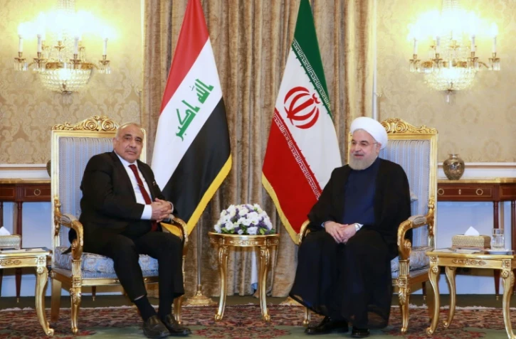 Le président iranien Hassan Rohani (gauche) lors d'une rencontre avec le Premier ministre irakien Adel Abdel Mahdi à Téhéran, le 22 juillet 2019. Photo distribuée par la présidence iranienne