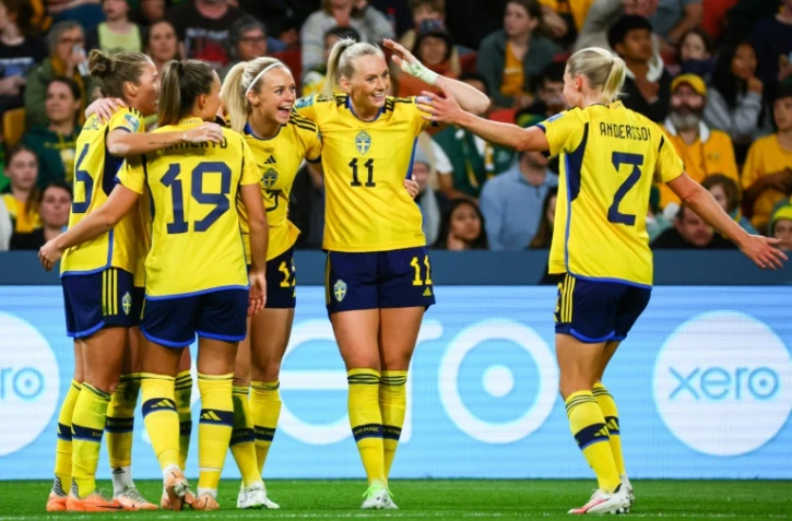 Les joueuses suédoises célèbrent leur but, lors de la petite finale du Mondial féminin contre l'Australie, le 19 août, à Brisbane.
