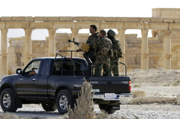 Des soldats syriens en patrouile le 6 mai 2016 Ă Palmyre