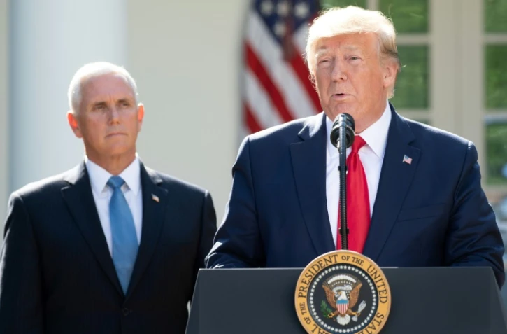 Le président américain Donald Trump, aux côtés de son vice-président Mike Pence, le 29 août 2019 à la Maison Blanche