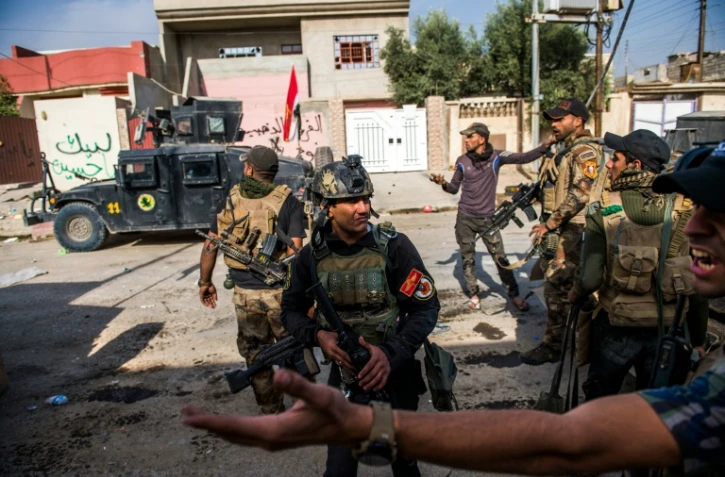 Des soldats des forces spéciales irakiennes dans le quartier de Karkoukli le 14 novembre 2016 à Mossoul
