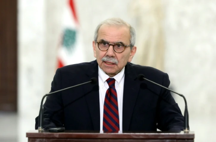 Photo transmise par la présidence libanaise montrant le nouveau Premier ministre Nawaf Salam s'exprimant devant la presse, le 8 février 2025 à Baabda, dans la banlieue sud de Beyrouth  