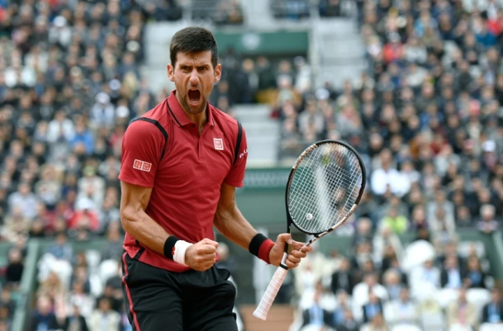 Novak Djokovic exulte après sa victoire sur Dominic Thiem en demi-finale à Roland-Garros, le 3 juin 2016 