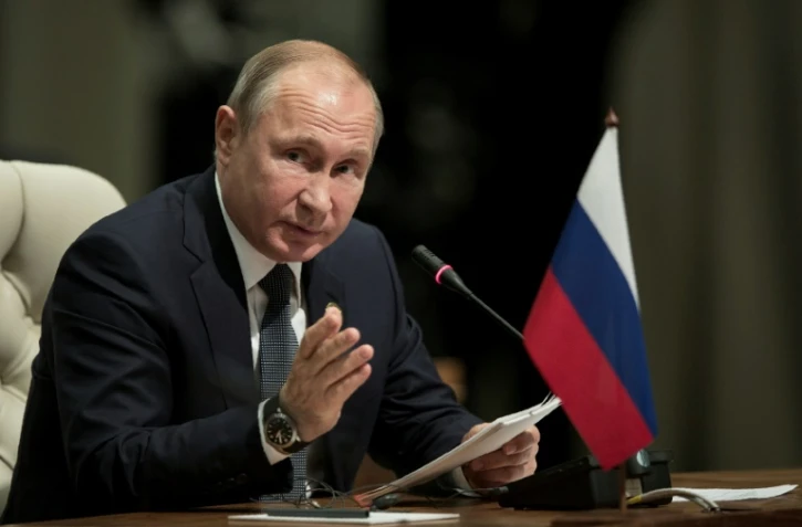 Vladimir Poutine s'est dit "prêt à se rendre à Washington", en marge du sommet des Brics à Johannesbourg en Afrique du Sud, le 27 juillet 2018 