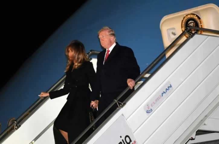 Le président américain Donald Trump et son épouse Melania arrivent à l'aéroport d'Orly le 9 novembre 2018