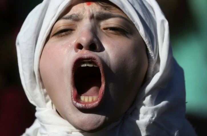 Une Chilienne manifeste contre le sexisme, à Santiago, le 6 juin 2018