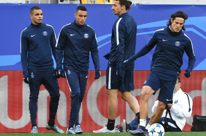 Les Parisiens Layvin Kurzawa, Gregory Van der Wiel, Zlatan Ibrahimovic et Edinson Cavani lors d'un entraînement le 29 septembre 2015 à Lviv