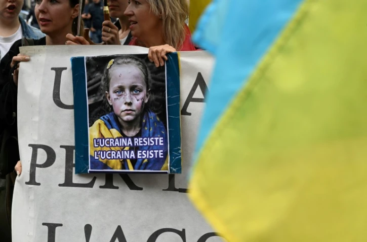Rassemblement de membres de la communauté ukrainienne place Barberini, à Rome, alors que Volodymyr Zelensky est attendu en Italie, le 13 mai 2023