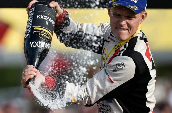 L'Estonien Ott Tänak (Toyota Yaris) fête son titre de champion du monde des rallyes (WRC) après sa 2e place au Rallye de Catalogne, le 27 octobre 2019 à Salou