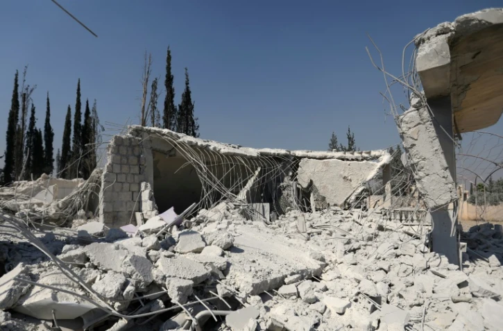 Les ruines d'un bâtiment frappé par les Etats-Unis dans la province d'Alep en Syrie le 1er juillet 2019