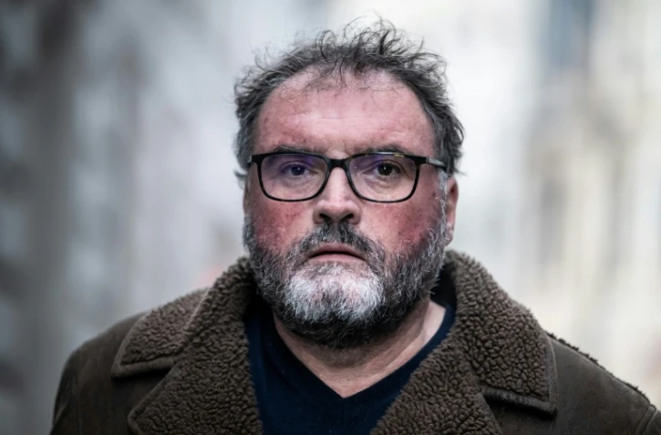 Frédéric Péchier arrive au palais de justice de Besançon le 15 décembre 2025