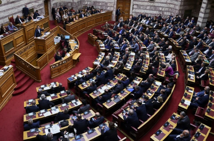 Le Premier ministre grec Alexis Tsipras fait un discours devant le parlement à Athènes, le 24 janvier 2019.