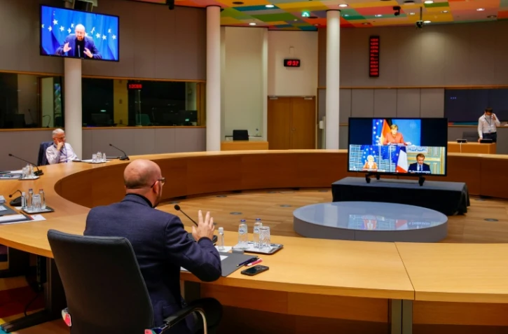 Le président du conseil européen Charles Michel en visioconférence avec la chancelière allemande Angela Merkel, la présidente de la Commission Ursula von der Leyen et le président français Emmanuel Macron le 20 octobre 2021, veille du sommet européen