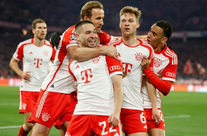La joie des joueurs du Bayern après le but de Joshua Kimmich (N.6) contre Arsenal, en quart de finale retour de la Ligue des champions, le 17 avril 2023 à Munich