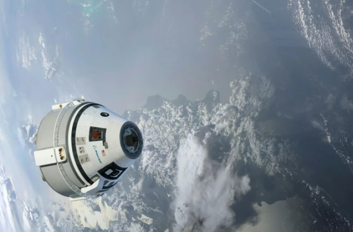 Illustration de la capsule Starliner en orbite autour de la Terre, fournie par Boeing en 2015