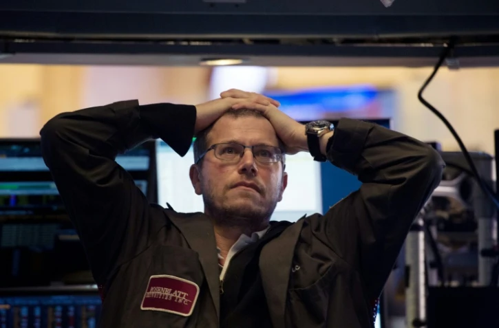 Traders à la cloture sur le New York Stock Exchange le 5 février 2018 