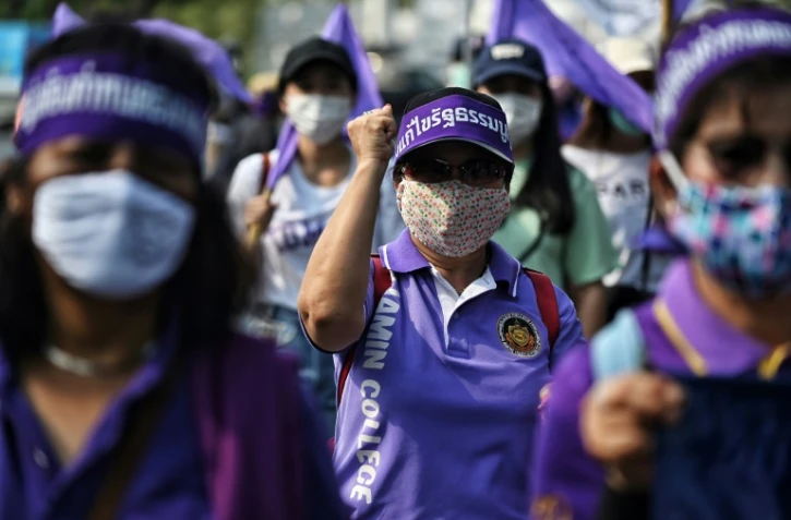 Des militantes et des syndicalistes manifestent à l'occasion de la journée internationale des droits des femmes, le 8 mars 2020 à Bangkok, en Thaïlande