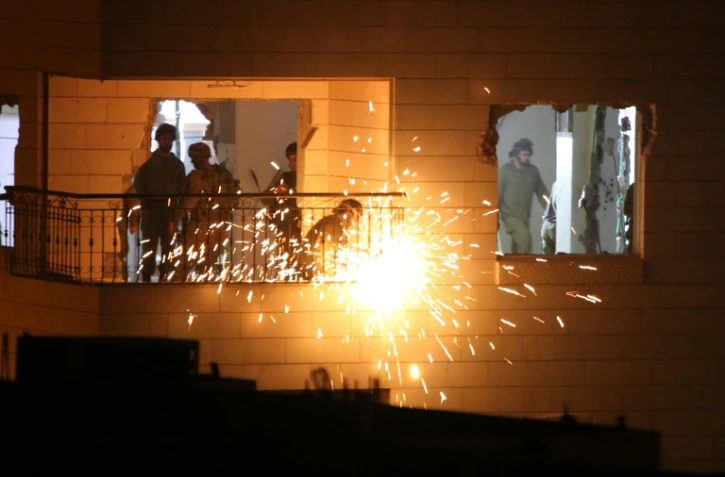 Les soldats israéliens détruisent le 20 octobre 2015 l'appartement d'un Palestinien qui avait tué une Israélienne fin 2014 à Hébron