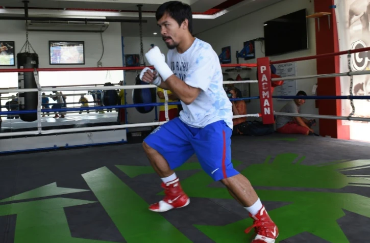Le boxeur philippin Manny Pacquiao, portant des shorts et chaussures au logo Nike, pendant un entraînement à General Santos, sur l'île des Mindanao aux Philippines, le 15 février 2016