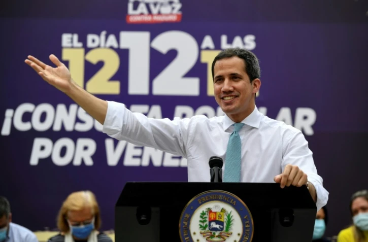 Juan Guaido s'exprime lors d'un discours à Caracas le 11 décembre 2020 pour appeler à une consultation populaire au Venezuela