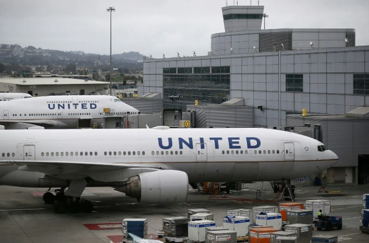 La compagnie américaine United Airlines, ici à San Fransisco le 7 juillet 2015, est critiquée pour l'expulsion musclée d'un passager