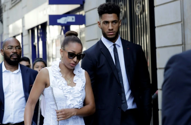 Le poids lourd français Tony Yoka, à son arrivée, avec sa compagne Estelle Mossely, pour une audition devant l'AFLD à Paris, le 20 juin 2018