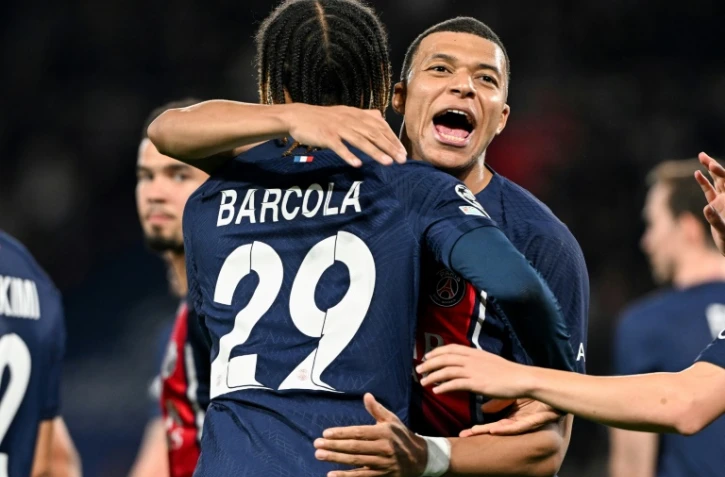 Bradley Barcola et Kylian Mbappé, les deux buteurs du Paris SG, au cours du huitième de finale de C1 contre la Real Sociedad le 14 févRier 2024 au Parc des Princes à Paris