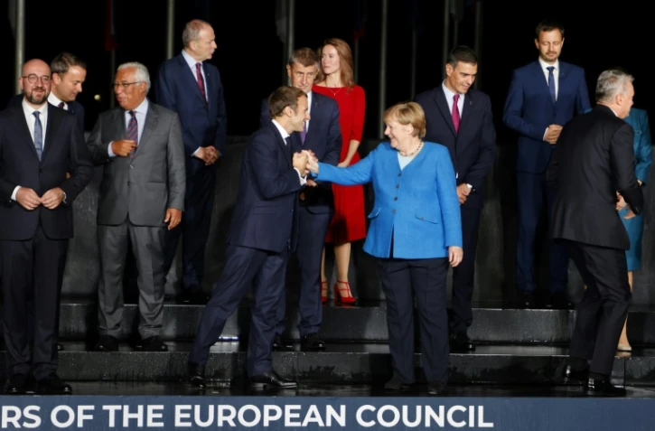 Emmanuel Macron, Angela Merkel et des dirigeants des pays membres de l'UE et des pays des Balkans à leur arrivée au château de Brdo le 5 octobre 2021