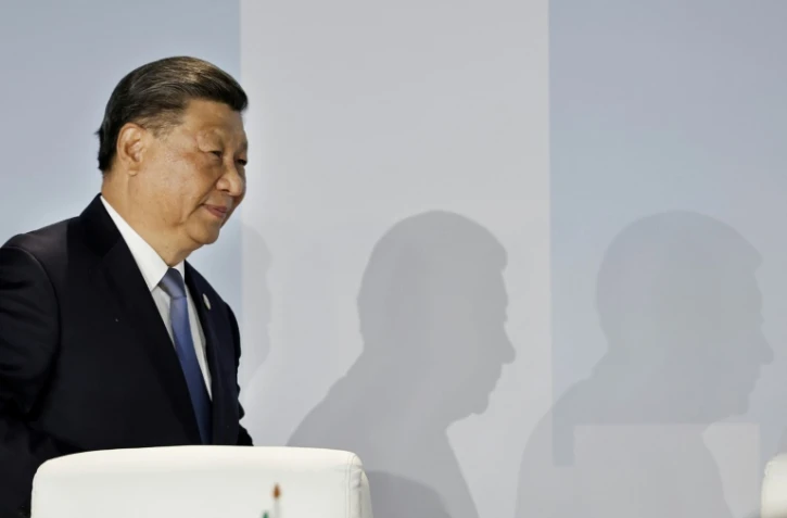 China's President Xi Jinping looks on during the 2023 BRICS Summit in Johannesburg on August 24, 2023
